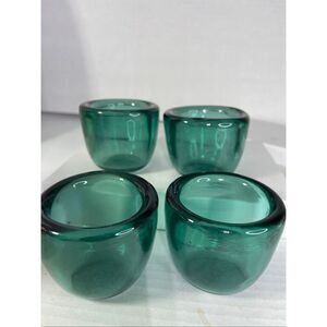 Lot of 4 sea green thick glass tea light holders.